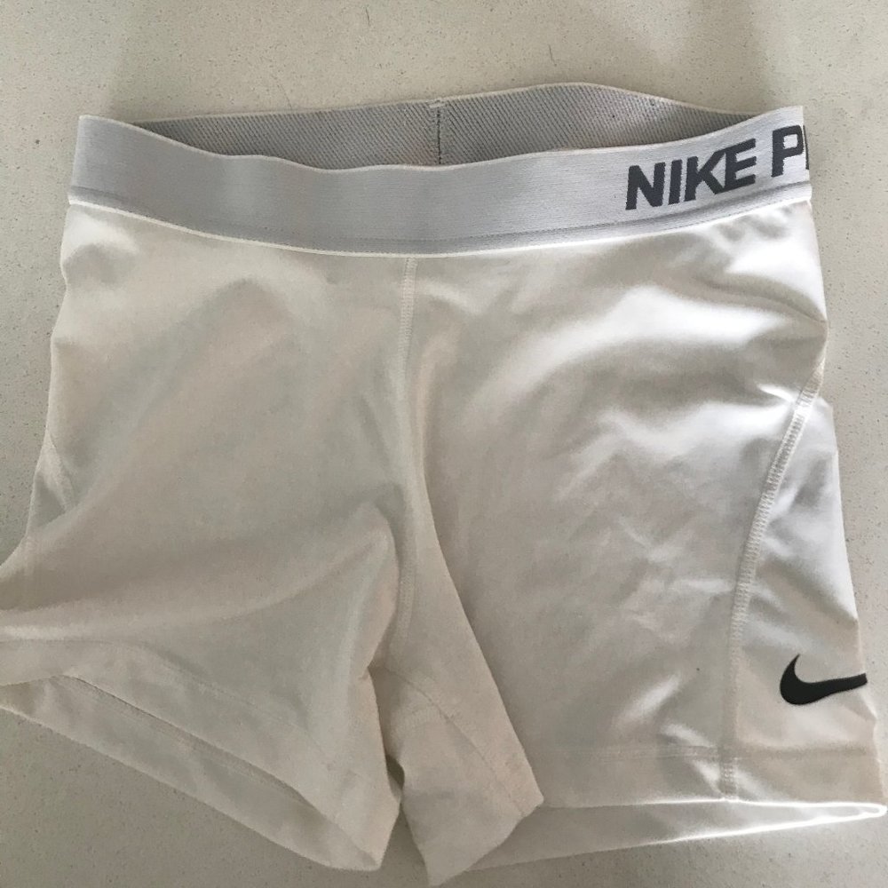 Nike pro short dri-fit for woman in white, medium